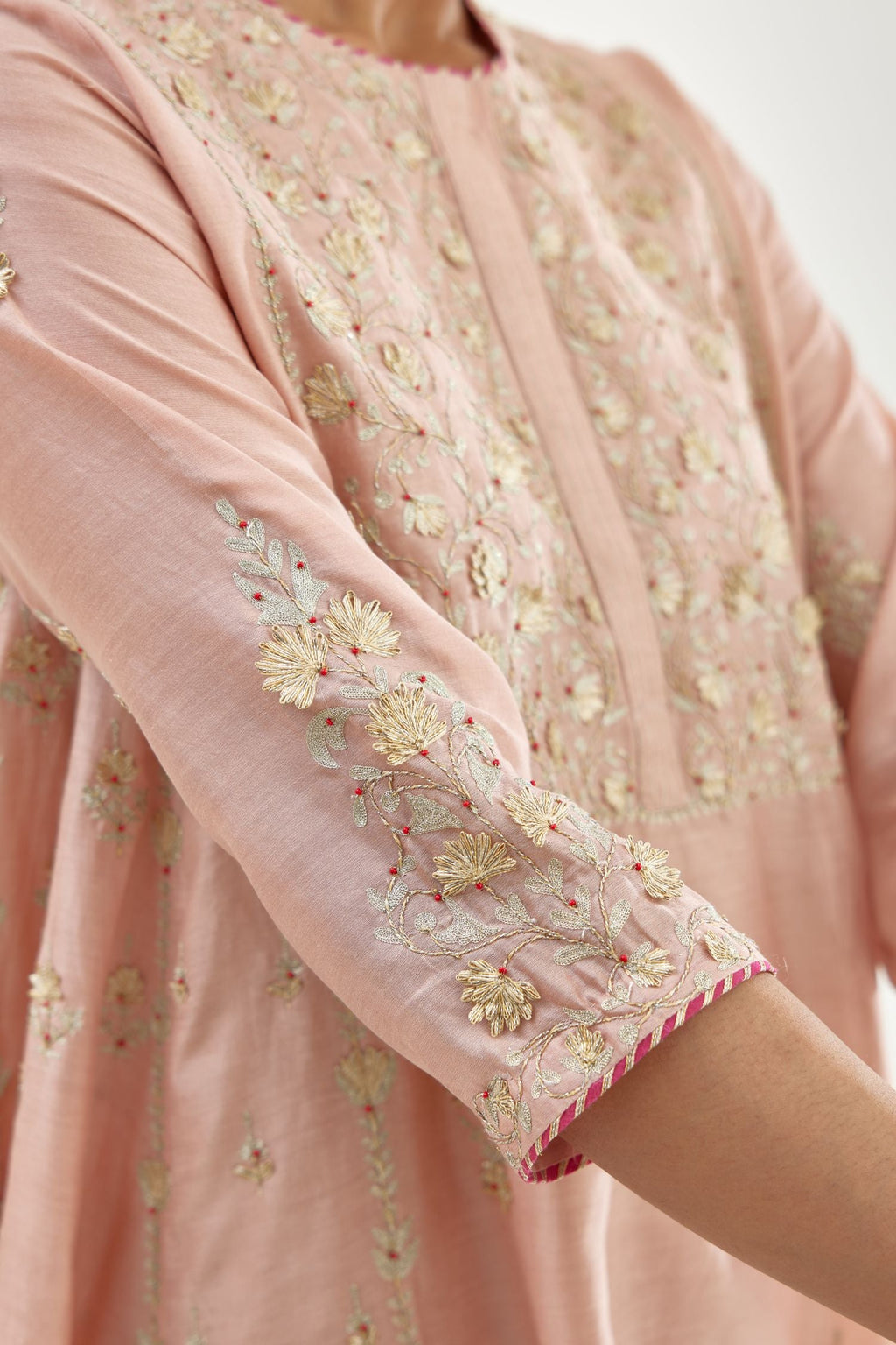 Pink A-line long kurta with all-over zari, dori, sequins and gota embroidery.