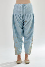 Blue silk chanderi salwar, detailed with zari, dori, bead and gota embroidered boota at sides.