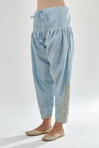 Blue silk chanderi salwar, detailed with zari, dori, bead and gota embroidered boota at sides.