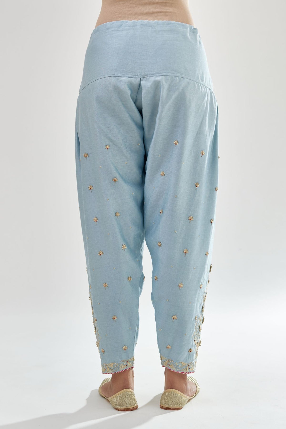 Blue silk chanderi salwar, detailed with zari, dori, bead and gota embroidered boota at sides.