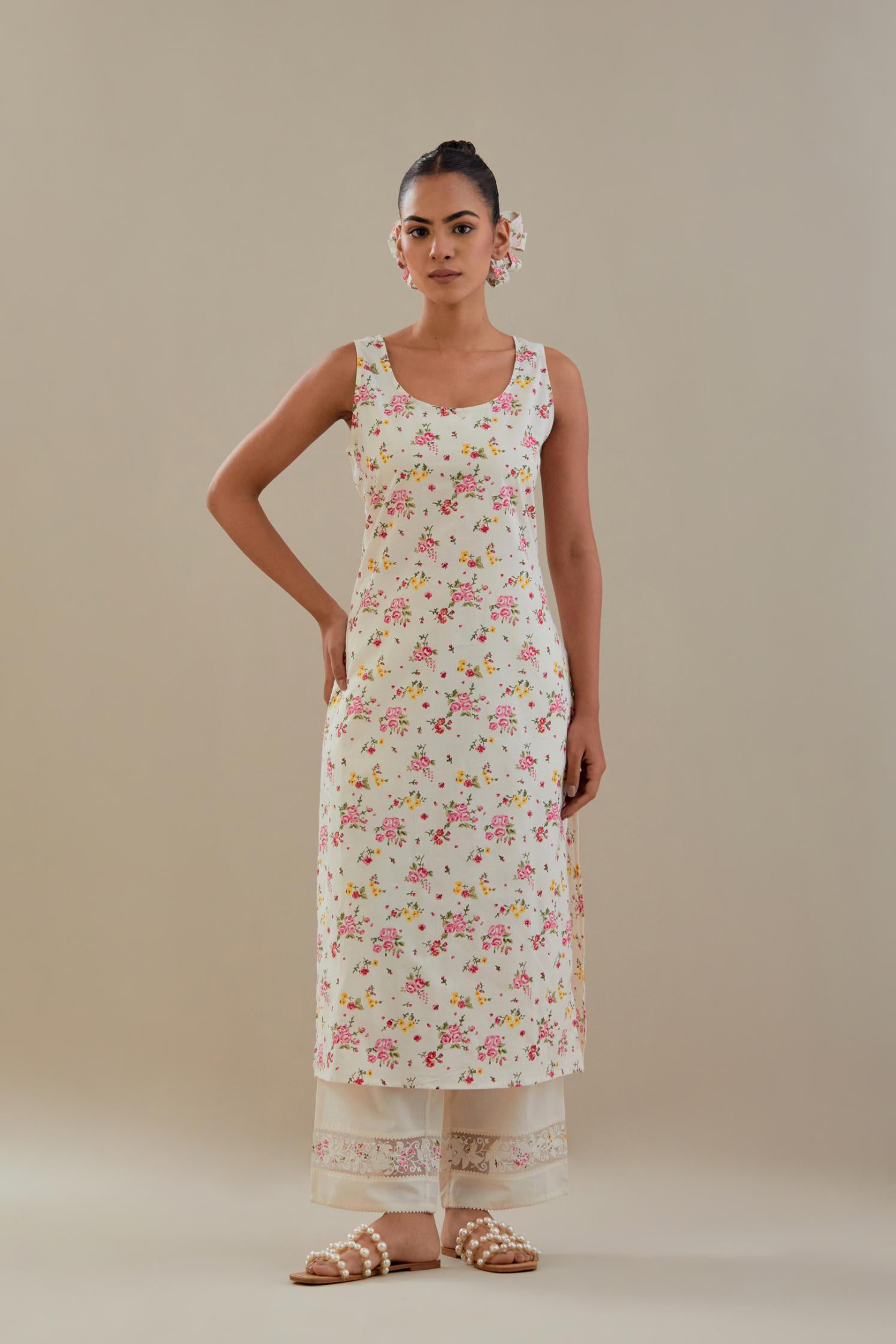 Off white cotton chanderi straight kurta set with off white thread embroidery and delicate beaded hand work.