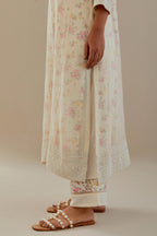 Off white cotton chanderi straight kurta set with heavy embroidered button placket neckline and delicate bead, tassel work at side panel joint seams.