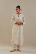 Off white cotton chanderi straight kurta set with off white thread embroidery and delicate beaded hand work at neck, sleeve and hem.