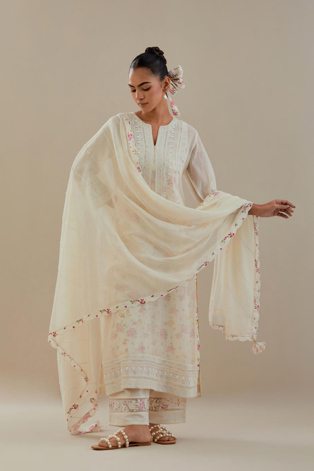 Off white cotton chanderi straight kurta set with off white thread embroidery and delicate beaded hand work at neck, sleeve and hem.