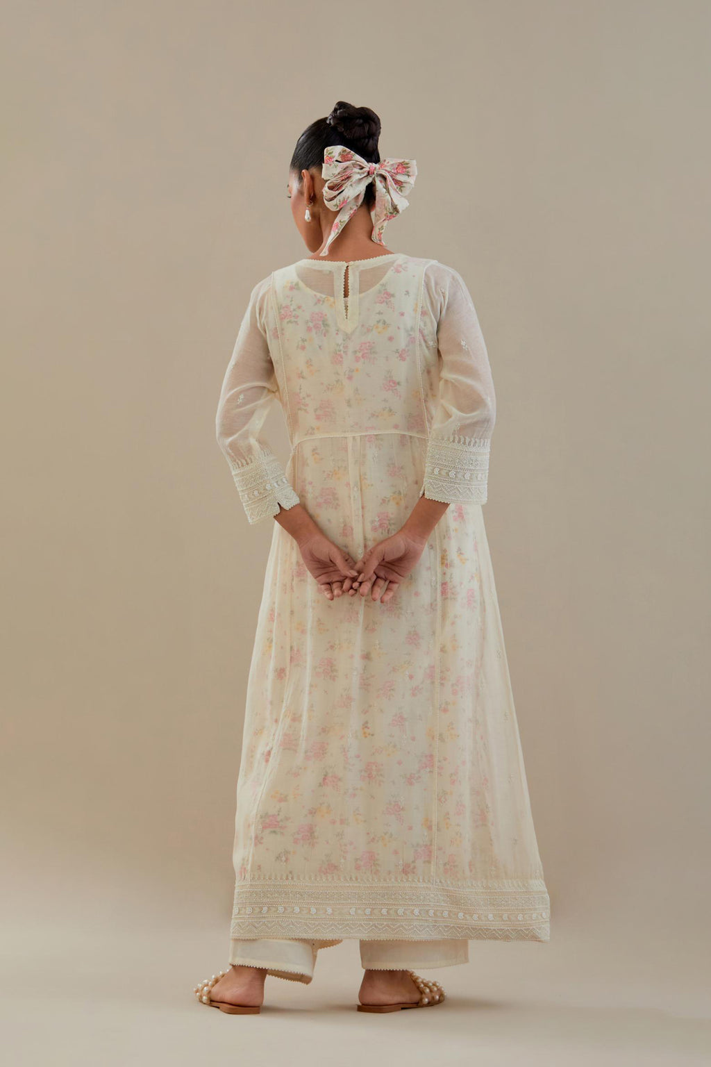 Off white cotton chanderi kurta set with hand block printed cotton slip inside, highlighted with all-over off white beads and thread embroidery.