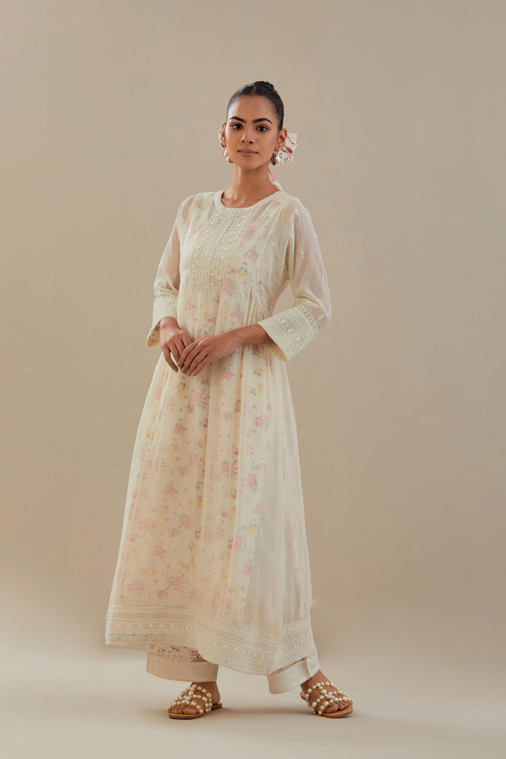 Off white cotton chanderi kurta set with hand block printed cotton slip inside, highlighted with all-over off white beads and thread embroidery.