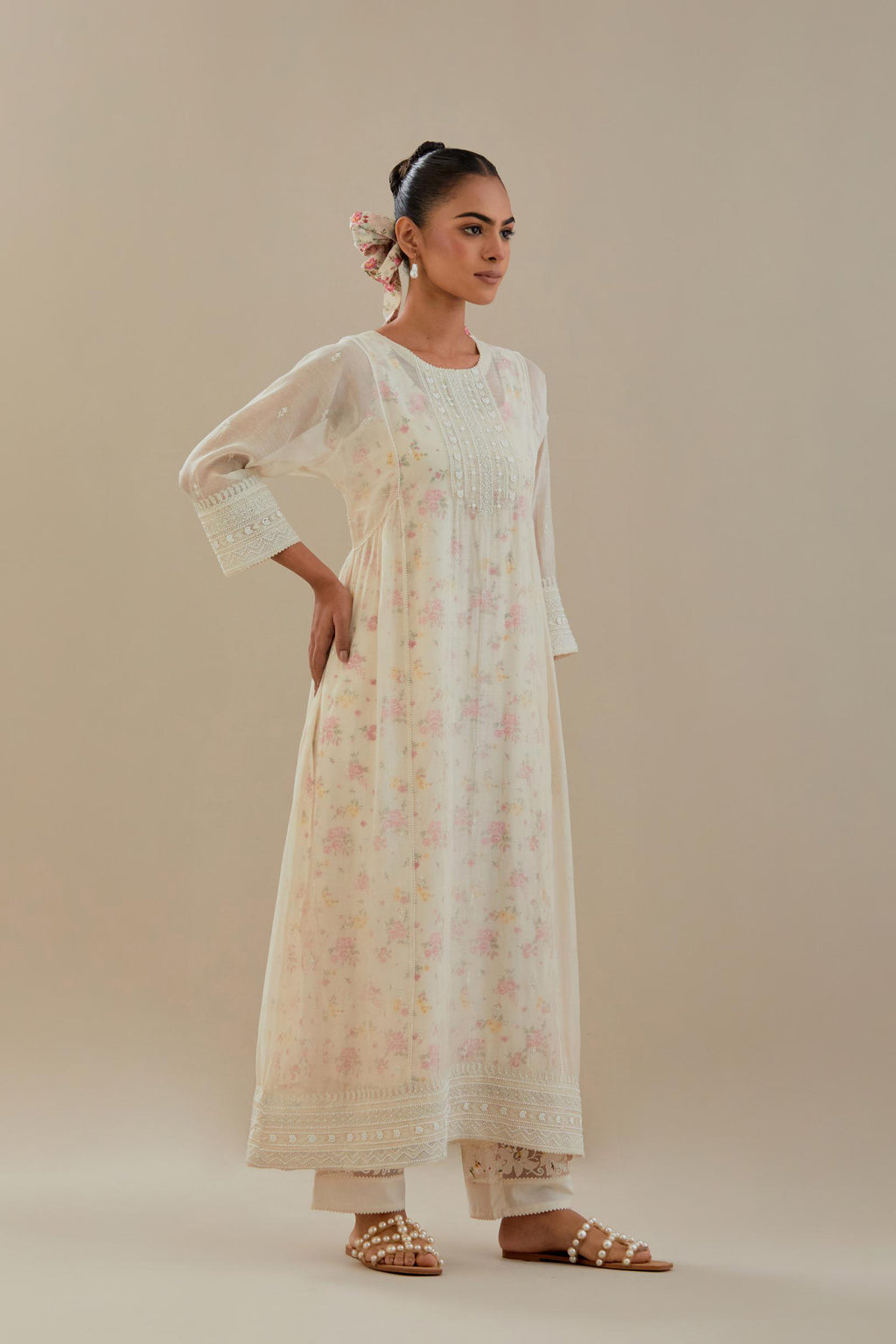 Off white cotton chanderi kurta set with hand block printed cotton slip inside, highlighted with all-over off white beads and thread embroidery.