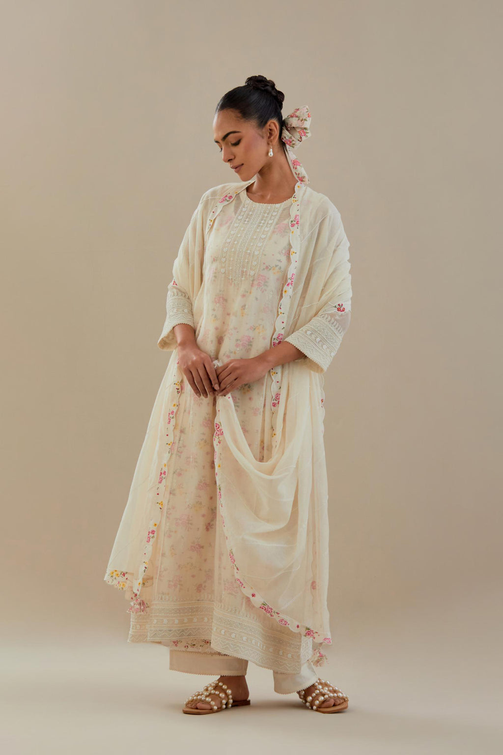 Off white cotton chanderi kurta set with hand block printed cotton slip inside, highlighted with all-over off white beads and thread embroidery.