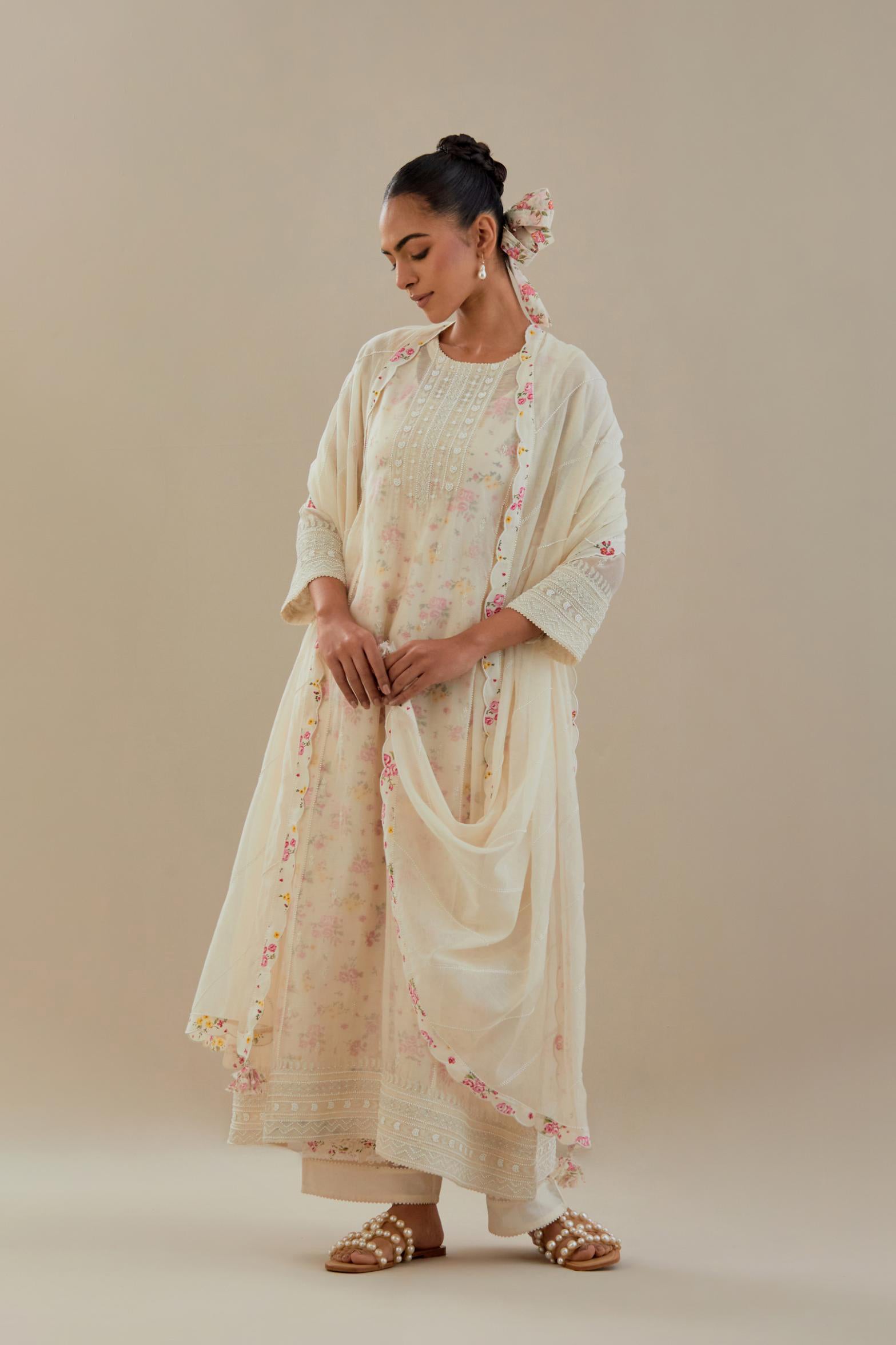 Off white cotton chanderi kurta set with hand block printed cotton slip inside, highlighted with all-over off white beads and thread embroidery.
