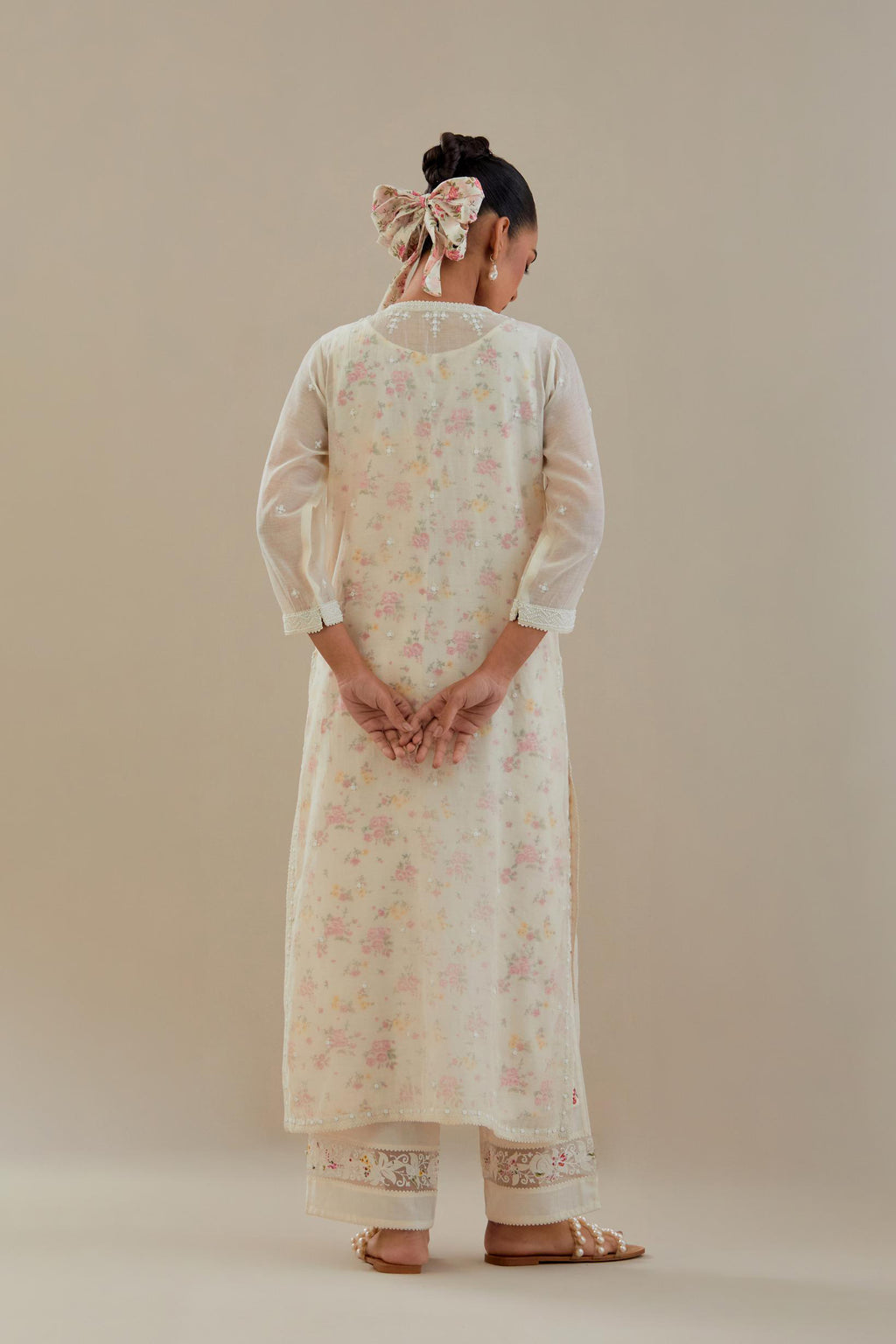 Off white cotton chanderi straight kurta set with off white thread embroidery and delicate beaded hand work.