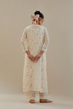 Off white cotton chanderi straight kurta set with off white thread embroidery and delicate beaded hand work.