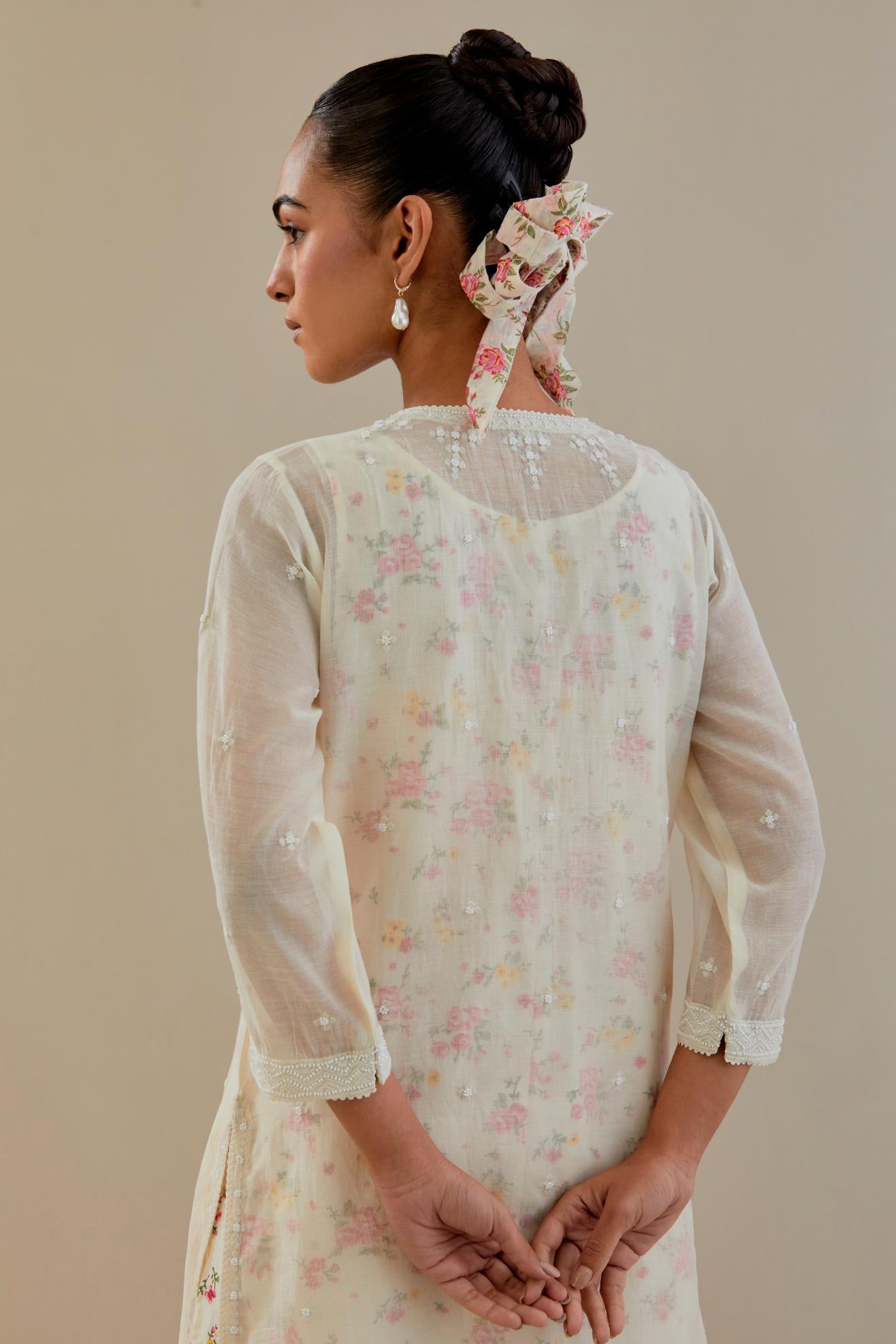 Off white cotton chanderi straight kurta set with off white thread embroidery and delicate beaded hand work.