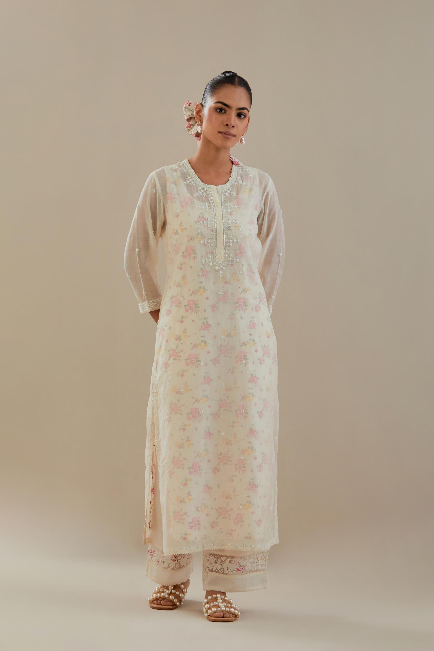 Off white cotton chanderi straight kurta set with off white thread embroidery and delicate beaded hand work.