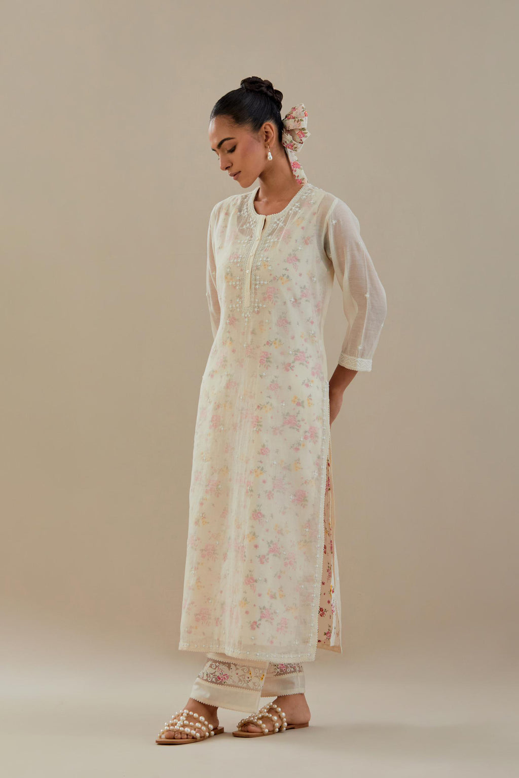 Off white cotton chanderi straight kurta set with off white thread embroidery and delicate beaded hand work.