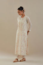 Off white cotton chanderi straight kurta set with off white thread embroidery and delicate beaded hand work.