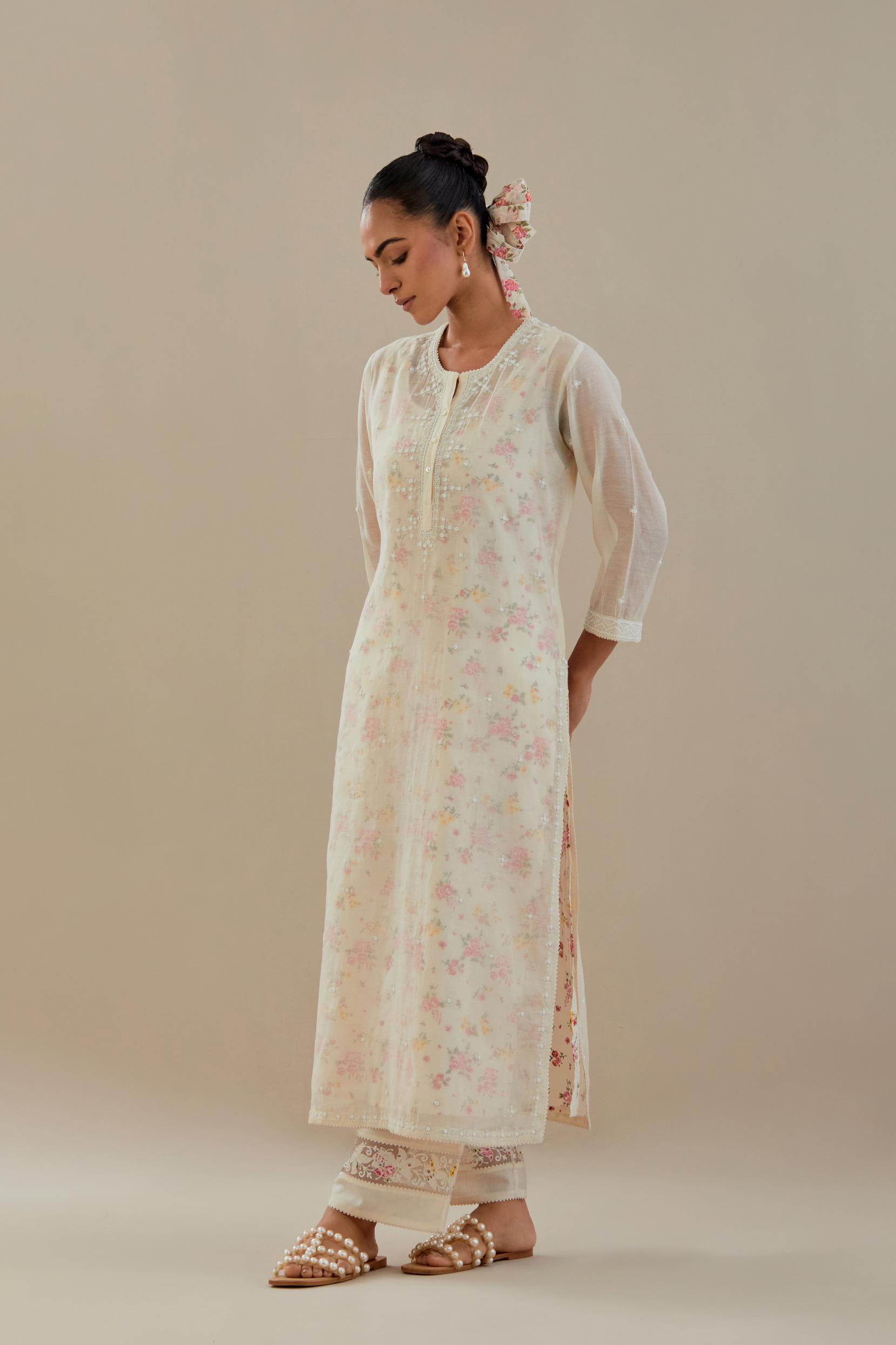 Off white cotton chanderi straight kurta set with off white thread embroidery and delicate beaded hand work.