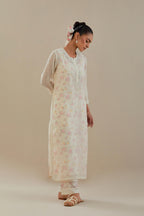 Off white cotton chanderi straight kurta set with off white thread embroidery and delicate beaded hand work.