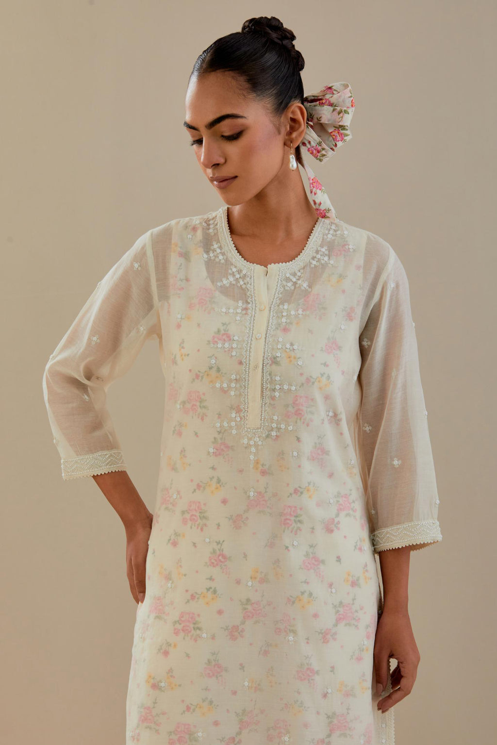 Off white cotton chanderi straight kurta set with off white thread embroidery and delicate beaded hand work.