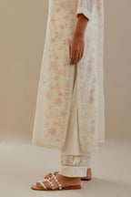 Off white cotton chanderi straight kurta set with off white thread embroidery and delicate beaded hand work.