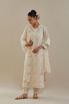Off white cotton chanderi straight kurta set with off white thread embroidery and delicate beaded hand work.