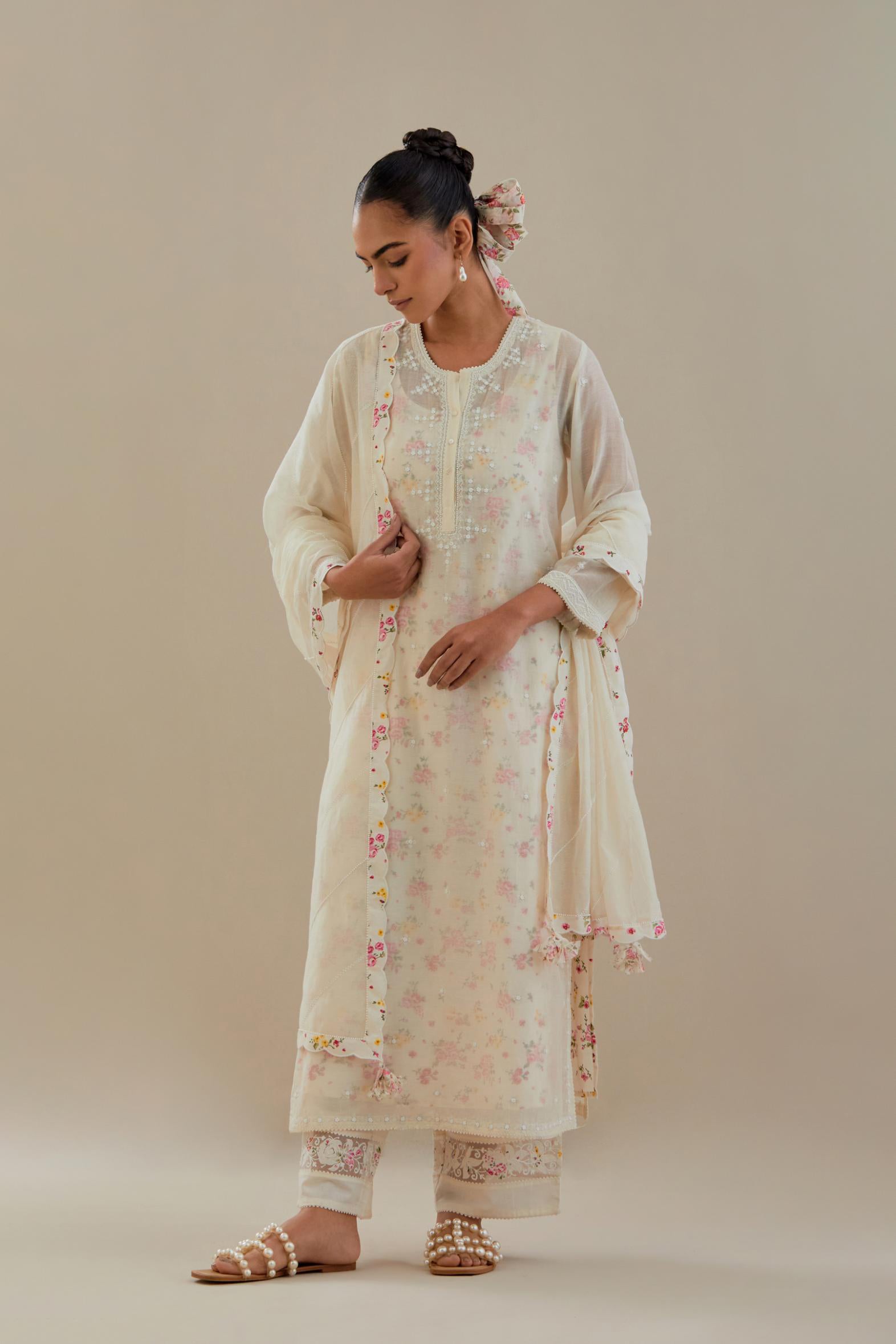 Off white cotton chanderi straight kurta set with off white thread embroidery and delicate beaded hand work.