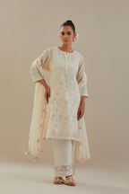 Off white cotton chanderi short kurta set, highlighted with delicate beads and thread embroidery.