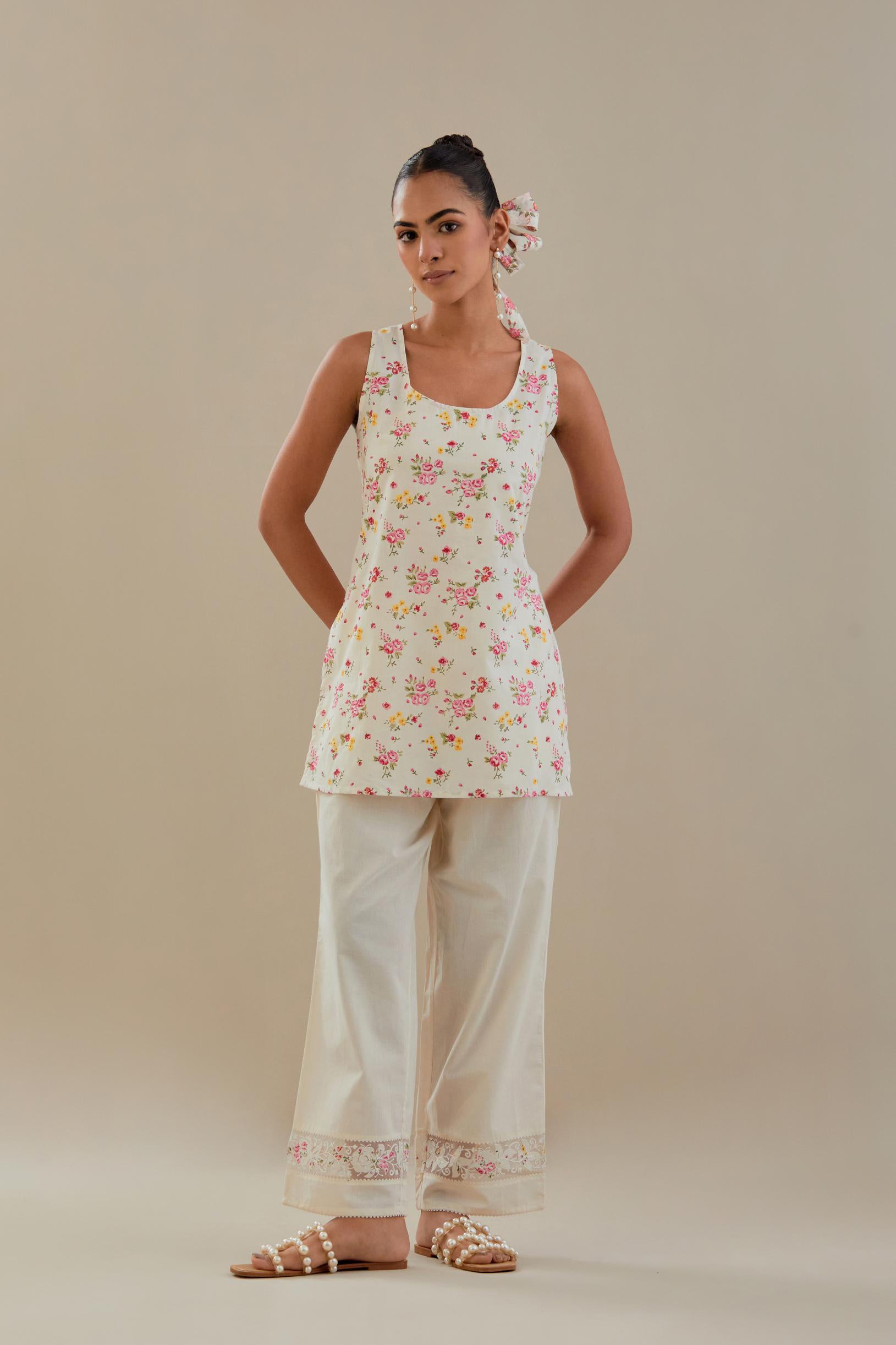Off white cotton Chanderi short Angrakha kurta set with all-over off white beads and thread embroidery.