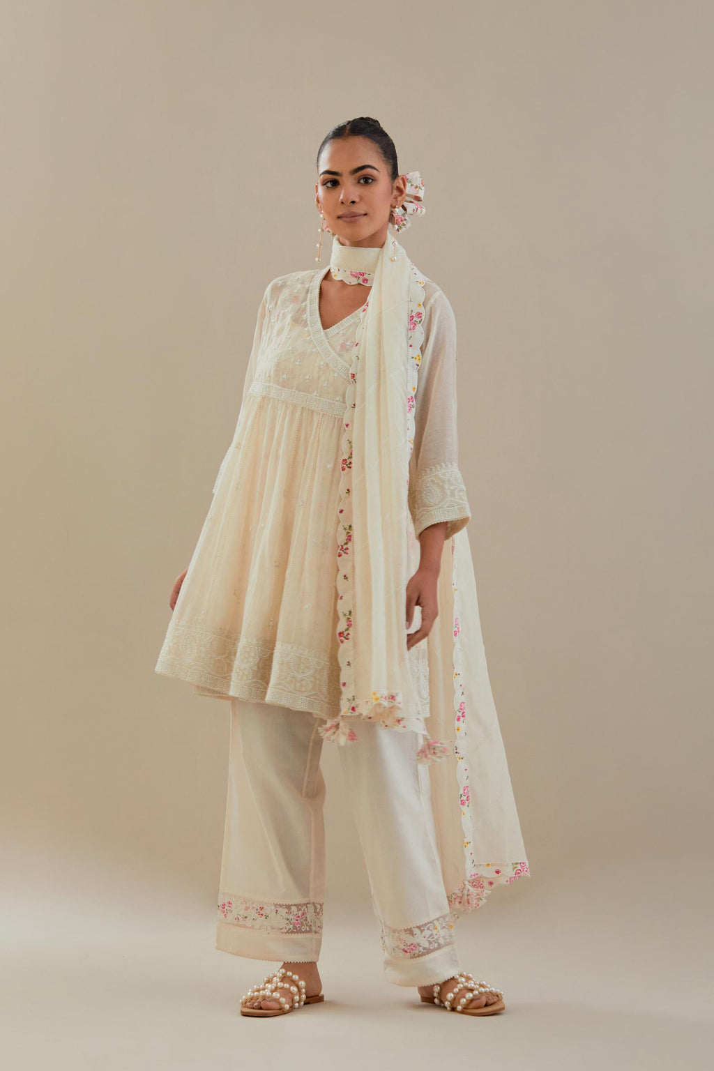 Off white cotton Chanderi short Angrakha kurta set with all-over off white beads and thread embroidery.