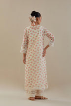Off white cotton chanderi kurta set with small floral hand block print, highlighted with applique embroidery and ricrac lace.