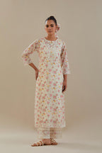 Off white cotton chanderi kurta set with small floral hand block print, highlighted with applique embroidery and ricrac lace.