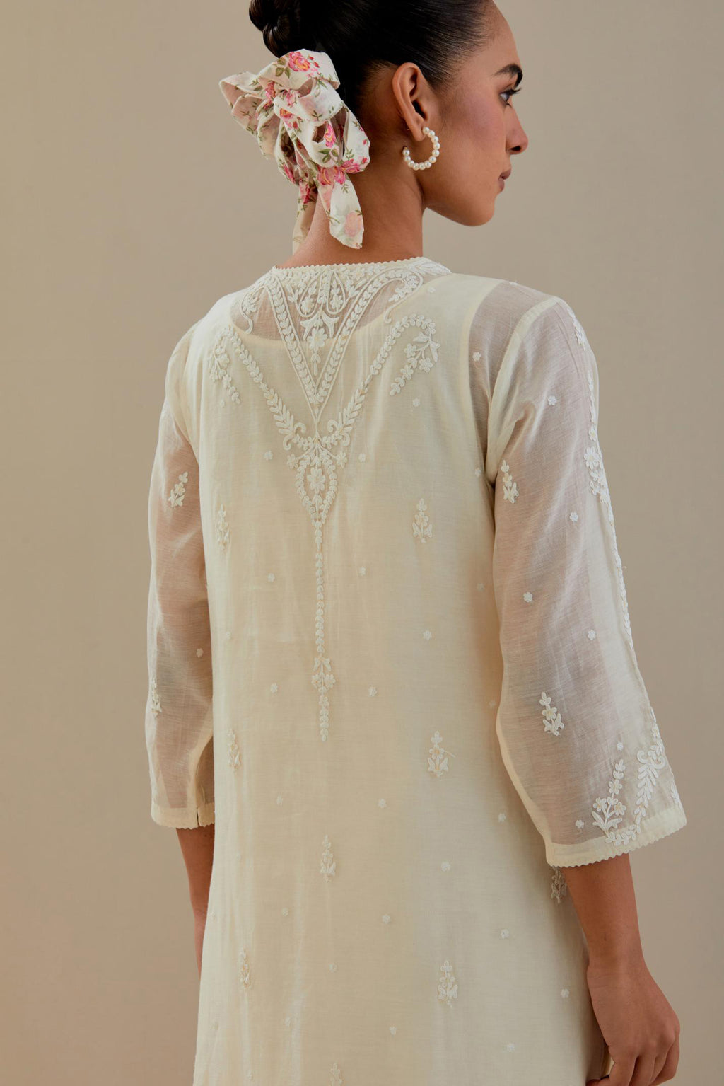 Off white cotton chanderi straight kurta set, highlighted with off white dori embroidery.