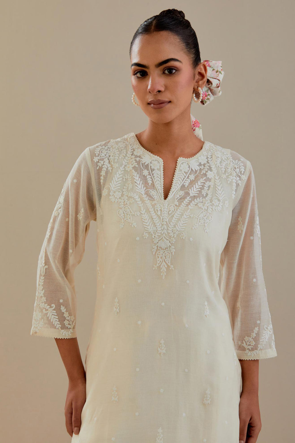 Off white cotton chanderi straight kurta set, highlighted with off white dori embroidery.