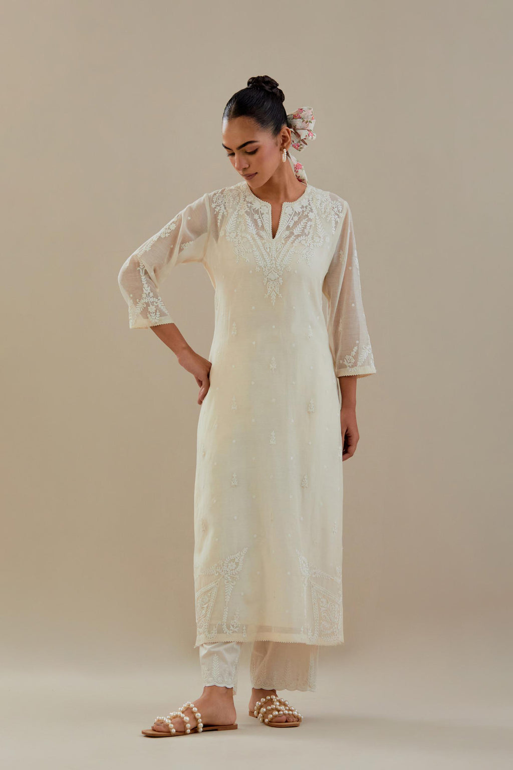 Off white cotton chanderi straight kurta set, highlighted with off white dori embroidery.
