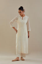 Off white cotton chanderi straight kurta set, highlighted with off white dori embroidery.