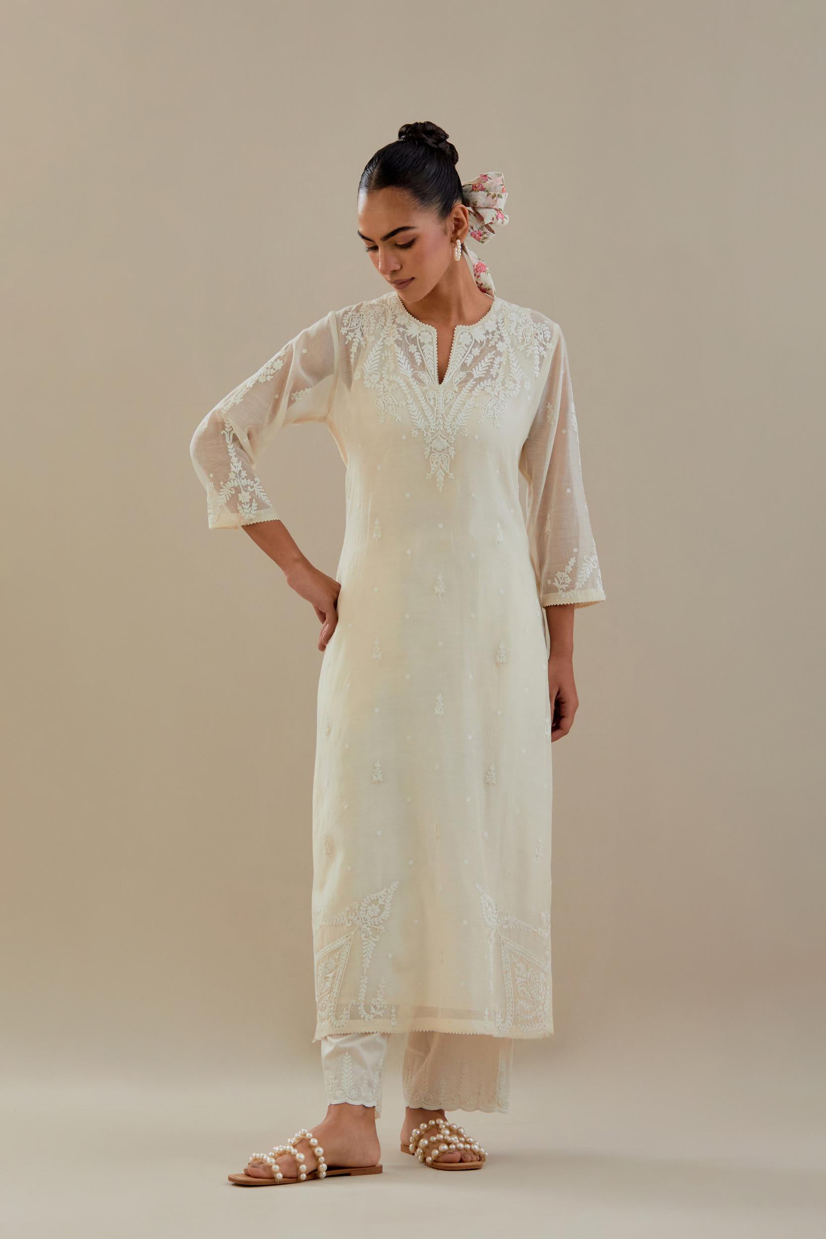 Off white cotton chanderi straight kurta set, highlighted with off white dori embroidery.