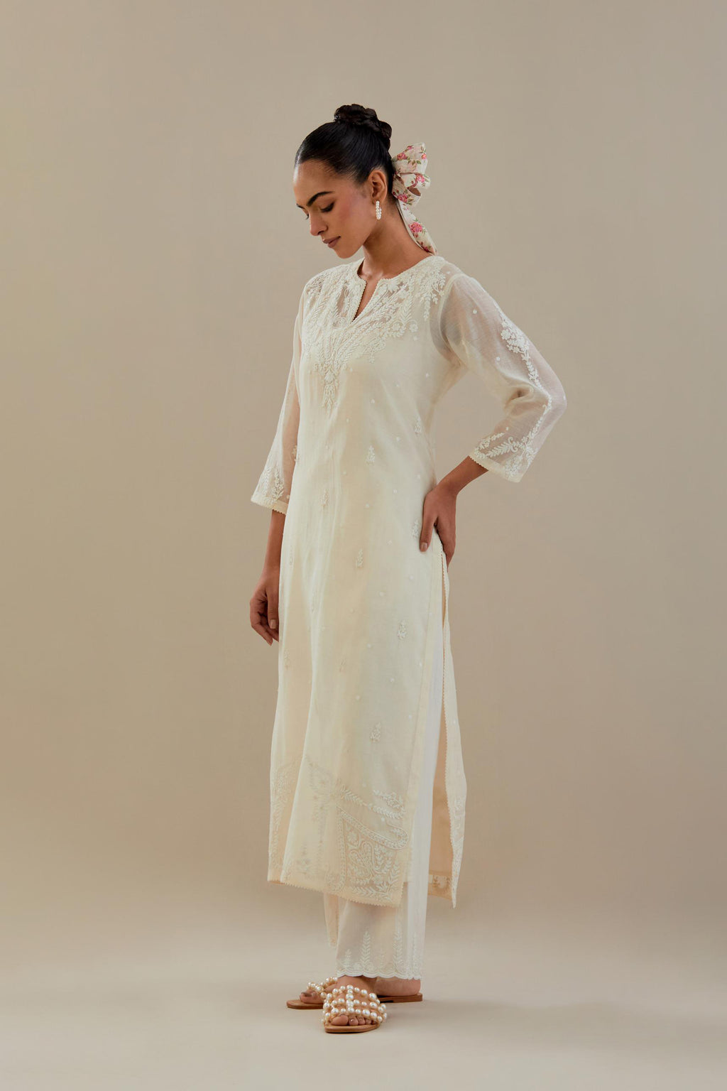 Off white cotton chanderi straight kurta set, highlighted with off white dori embroidery.