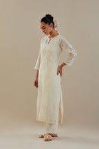 Off white cotton chanderi straight kurta set, highlighted with off white dori embroidery.