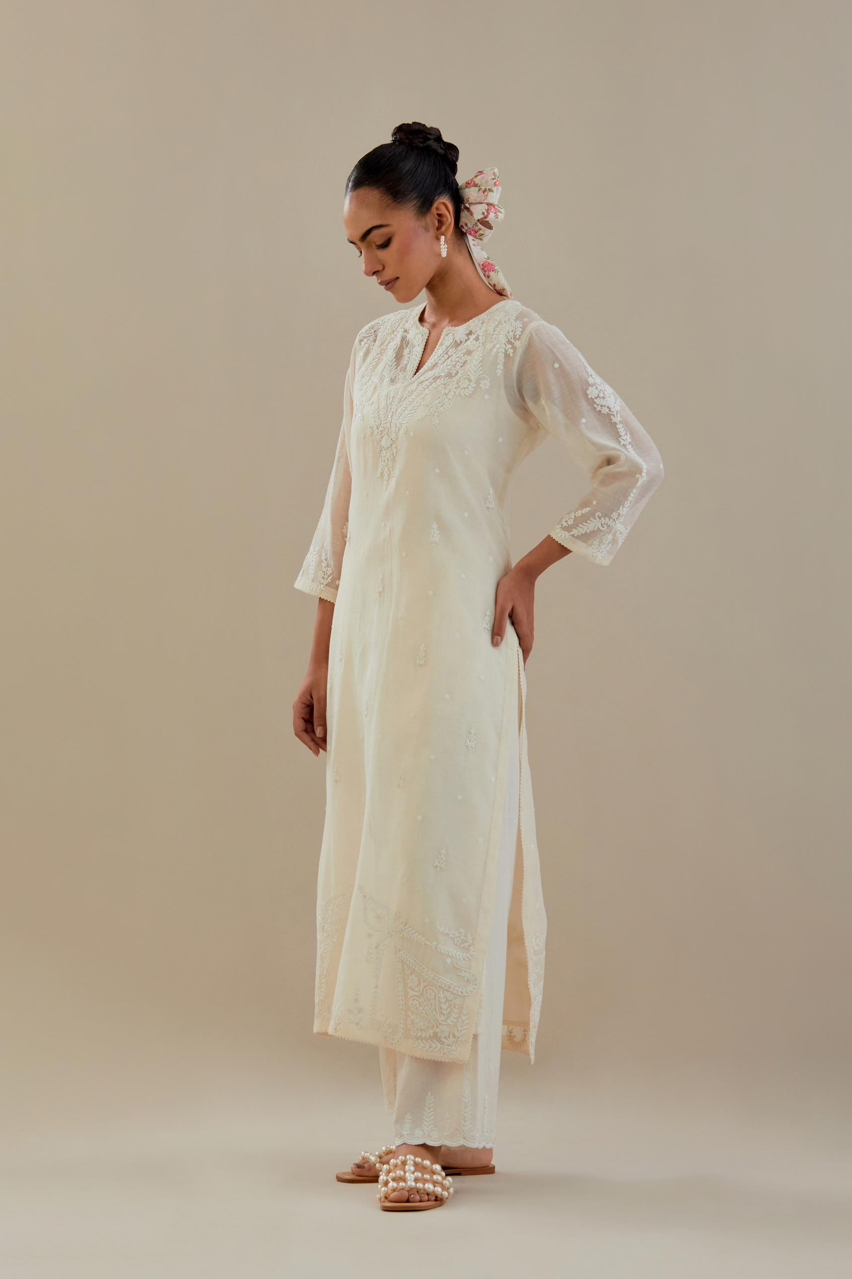 Off white cotton chanderi straight kurta set, highlighted with off white dori embroidery.