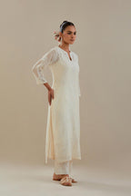 Off white cotton chanderi straight kurta set, highlighted with off white dori embroidery.