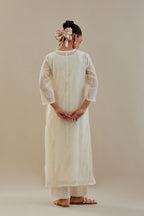 Off white cotton chanderi straight kurta set with off white dori embroidery, highlighted with sequins work.