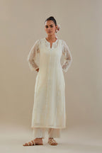 Off white cotton chanderi straight kurta set with off white dori embroidery, highlighted with sequins work.
