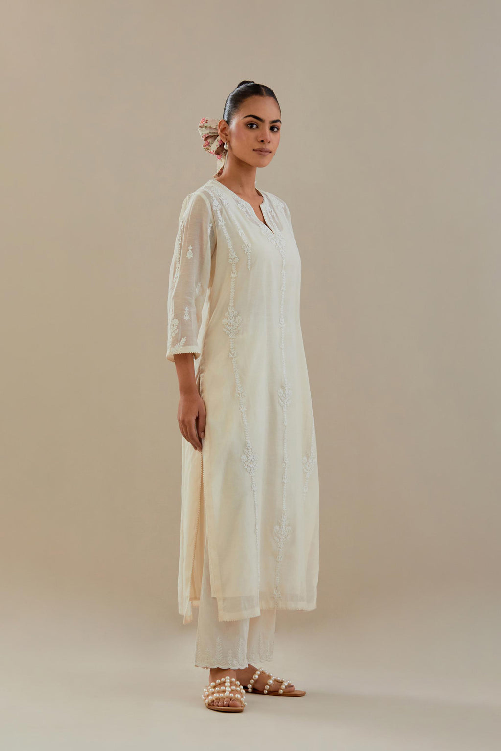 Off white cotton chanderi straight kurta set with off white dori embroidery, highlighted with sequins work.
