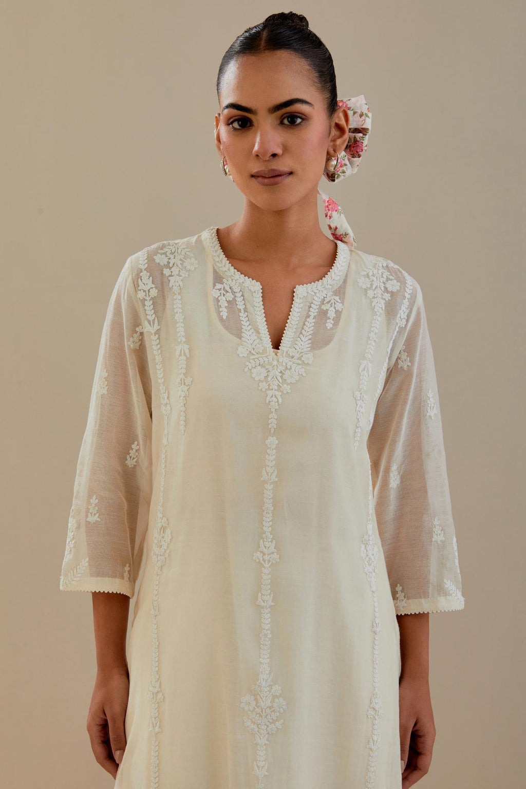 Off white cotton chanderi straight kurta set with off white dori embroidery, highlighted with sequins work.