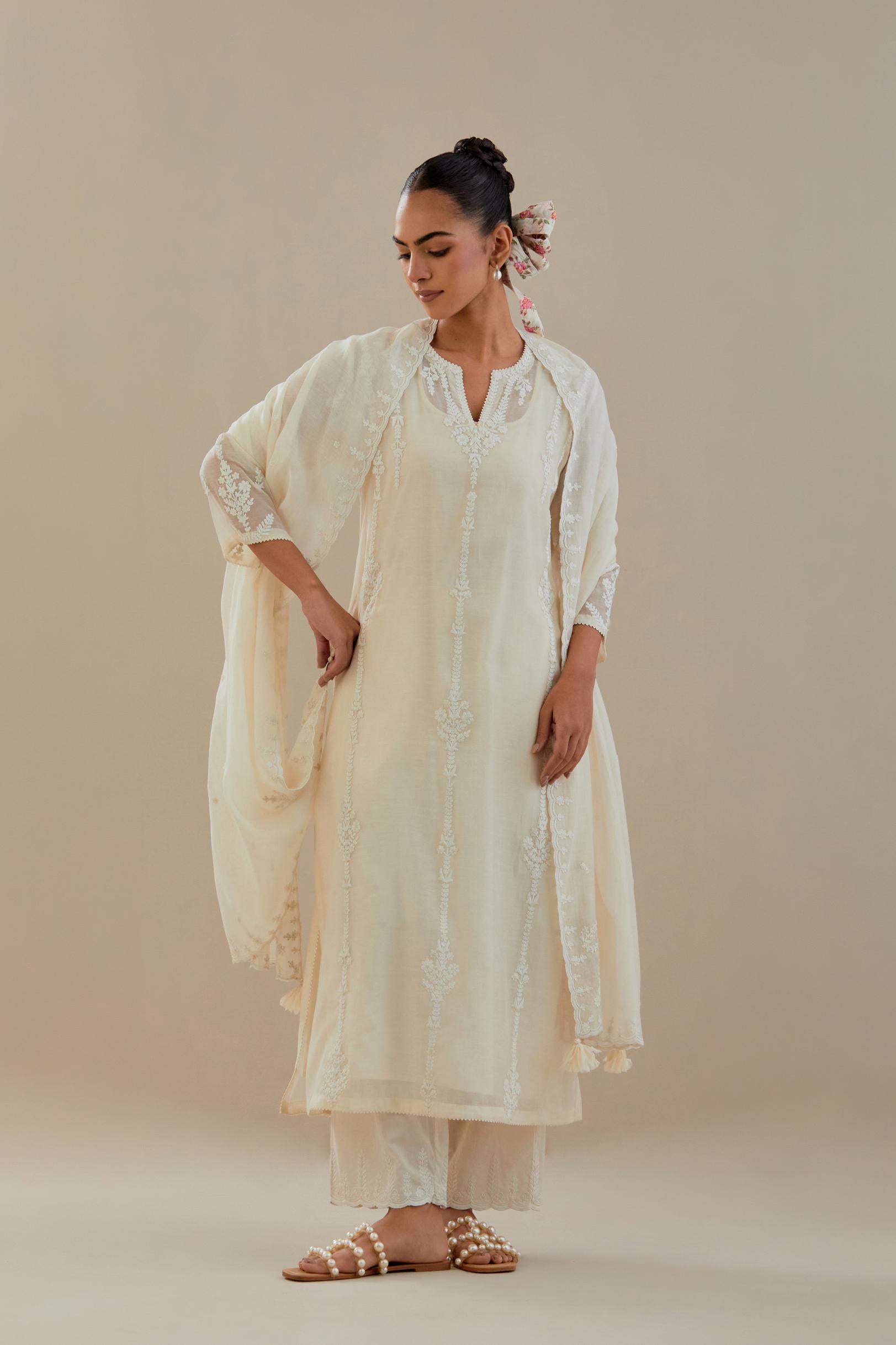 Off white cotton chanderi straight kurta set with off white dori embroidery, highlighted with sequins work.