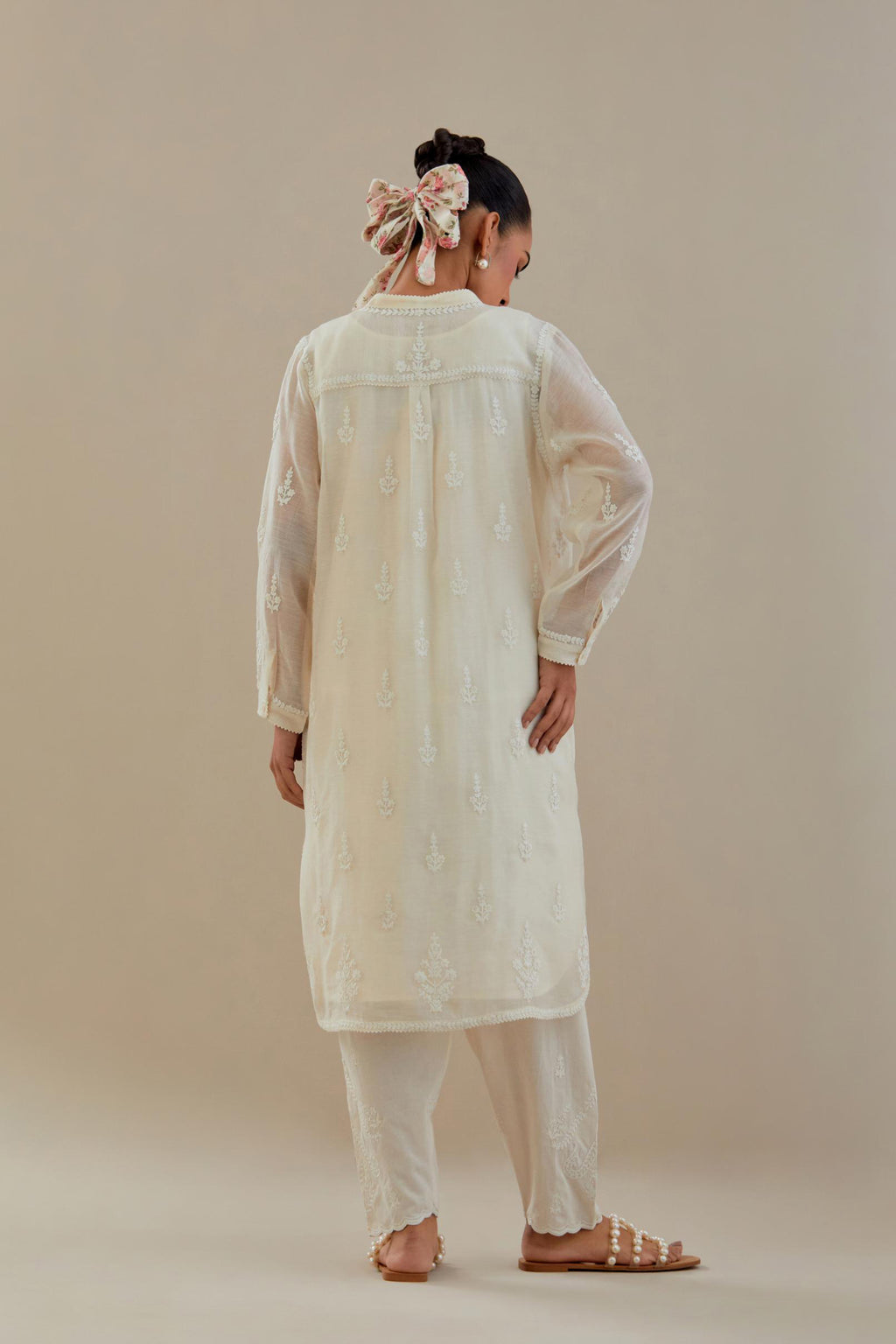 Off white cotton chanderi straight short kurta set with all-over off white dori embroidery.