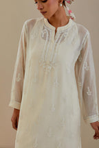 Off white cotton chanderi straight short kurta set with all-over off white dori embroidery.