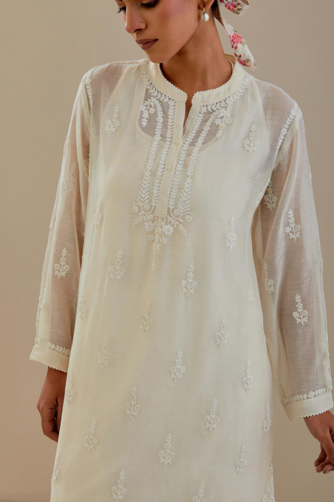 Off white cotton chanderi straight short kurta set with all-over off white dori embroidery.