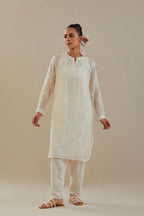 Off white cotton chanderi straight short kurta set with all-over off white dori embroidery.