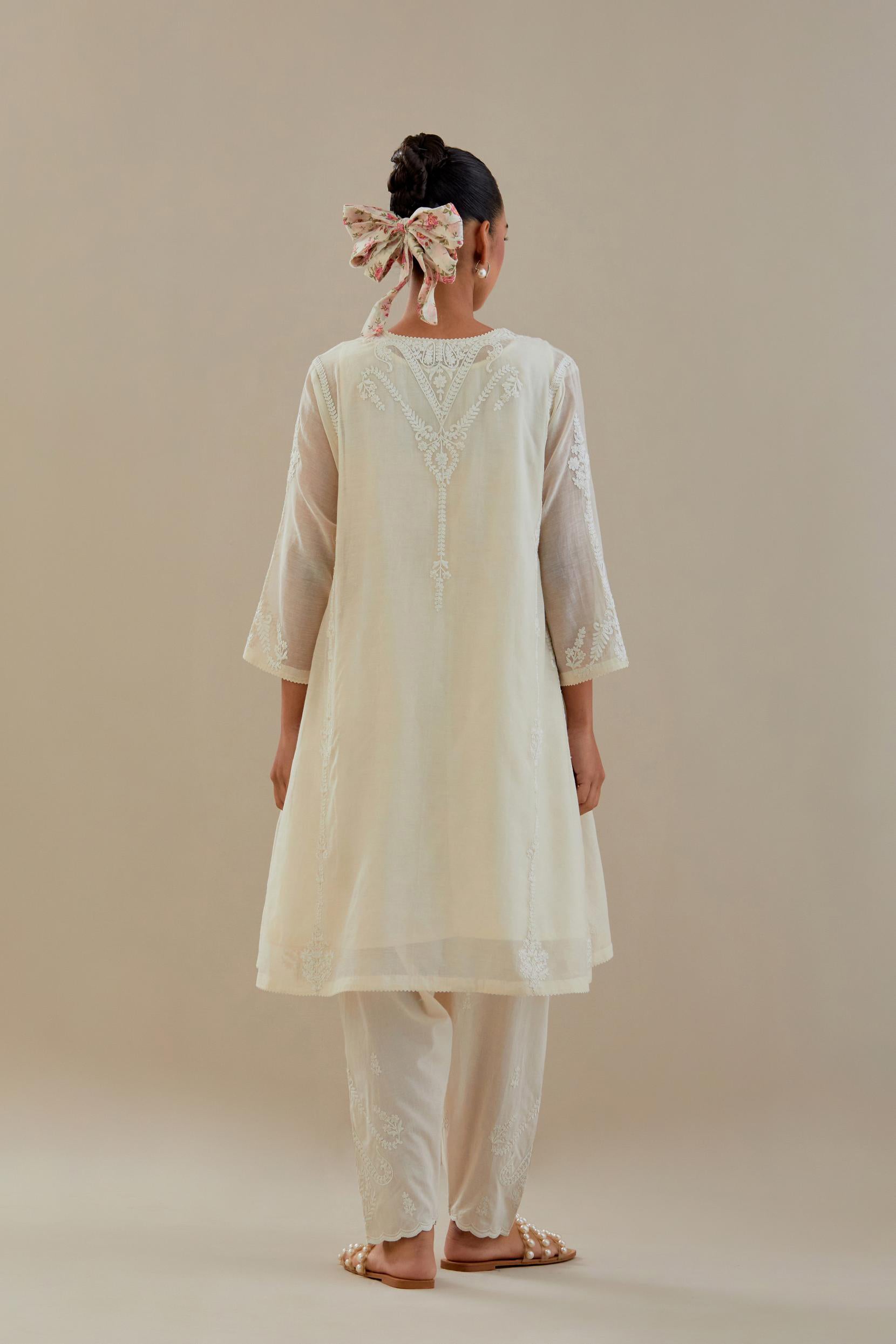 Off white cotton chanderi easy fit short kalidar kurta set with off white dori embroidery.