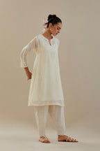 Off white cotton chanderi easy fit short kalidar kurta set with off white dori embroidery.